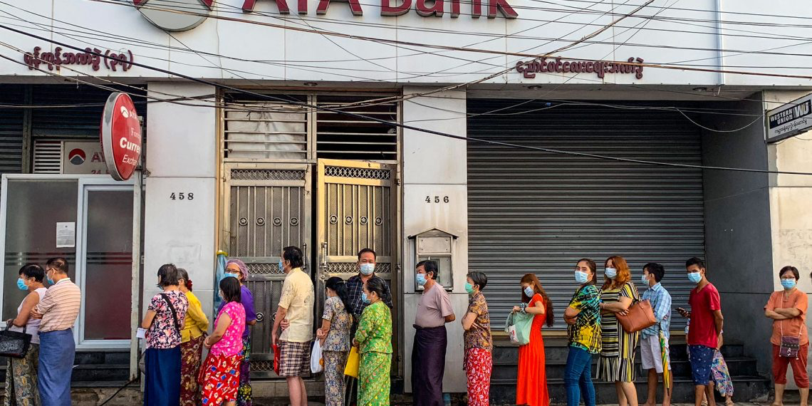Myanmar banks cap withdrawals amid currency and gold speculation