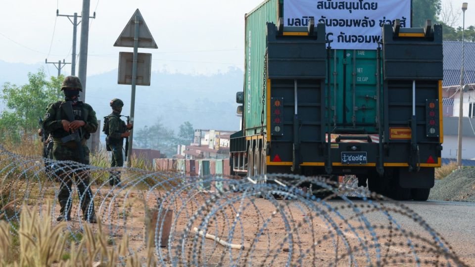 Thai soldiers stand next to barbed wire cordoning off an area at Thma Da on February 7, 2026. (AKP/AFP)