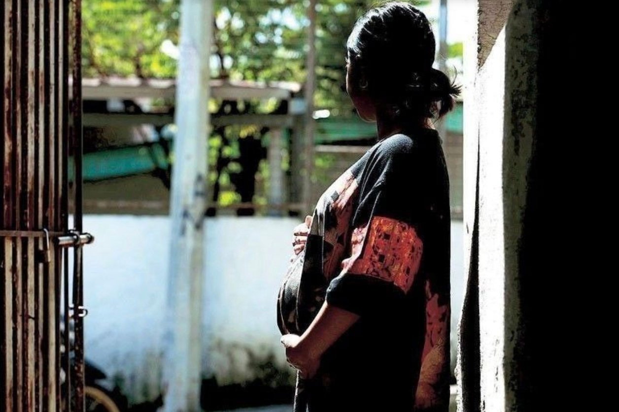 A teenage girl remains at home in Quezon City after leaving school due to pregnancy. (The Star)