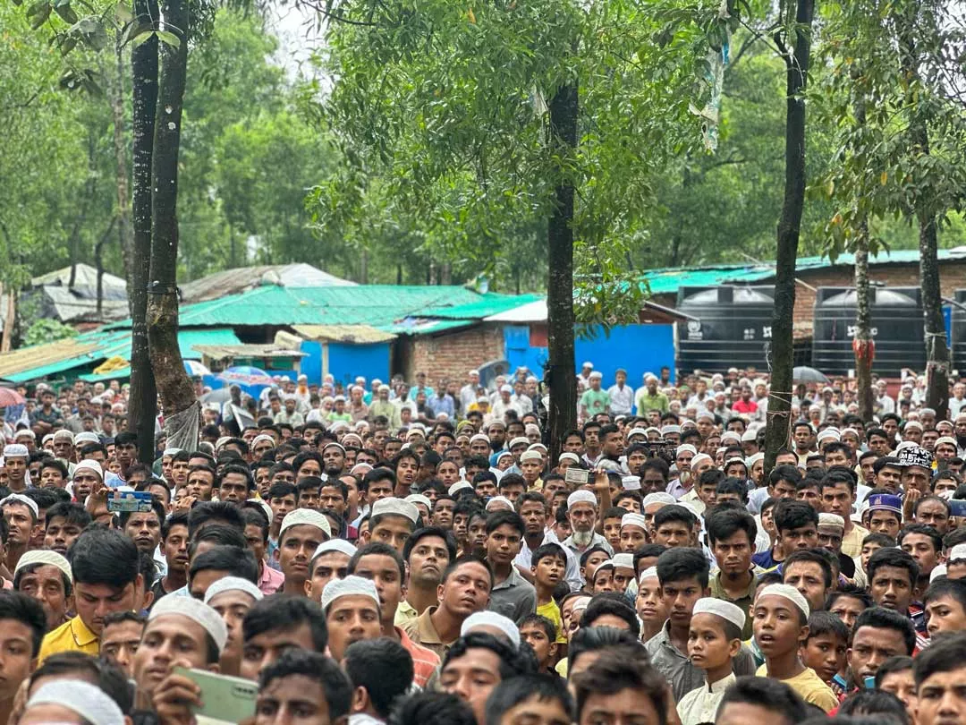 Rohingya refugees gather in Kutupalong Camp, Bangladesh, to mark Rohingya Genocide Remembrance Day amid worsening conditions and aid cuts, August 2023. (Nurul Absar)