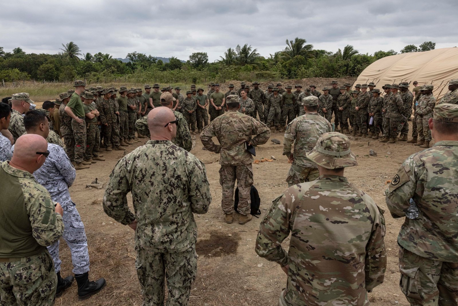 U.S. Marines of the 3rd Landing Support Battalion, alongside Army Soldiers, Navy Sailors, and members of the Armed Forces of the Philippines, attend a rehearsal of concept brief for Balikatan 23 at Camp Agnew, Casigueran, April 4, 2023. (U.S. Marine Corps Photo)