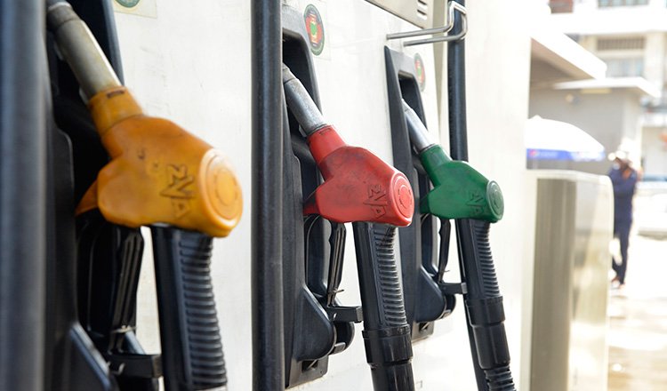 Fuel pump nozzles at a petrol station in Cambodia. (Khmer Times)