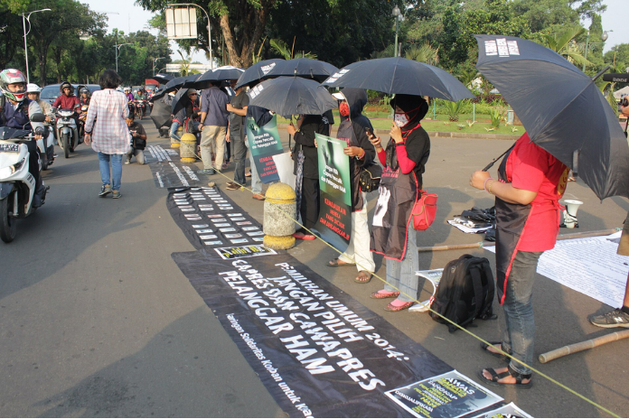A protest against human rights violations allegedly commited by the Indonesian government in Jakarta, Indonesia in 2015. (Wikimedia)