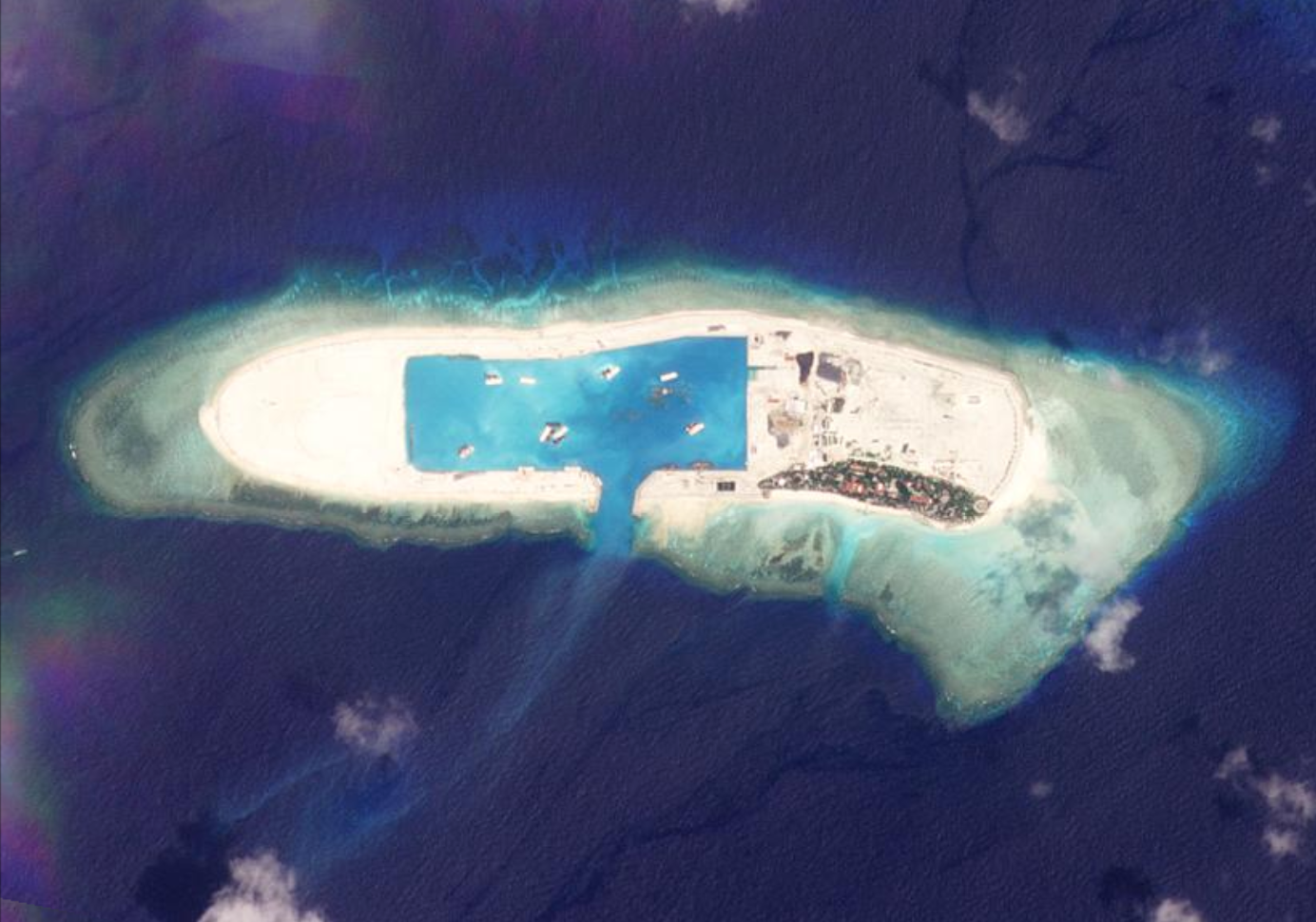 Hanoi ramps up island building in disputed waters