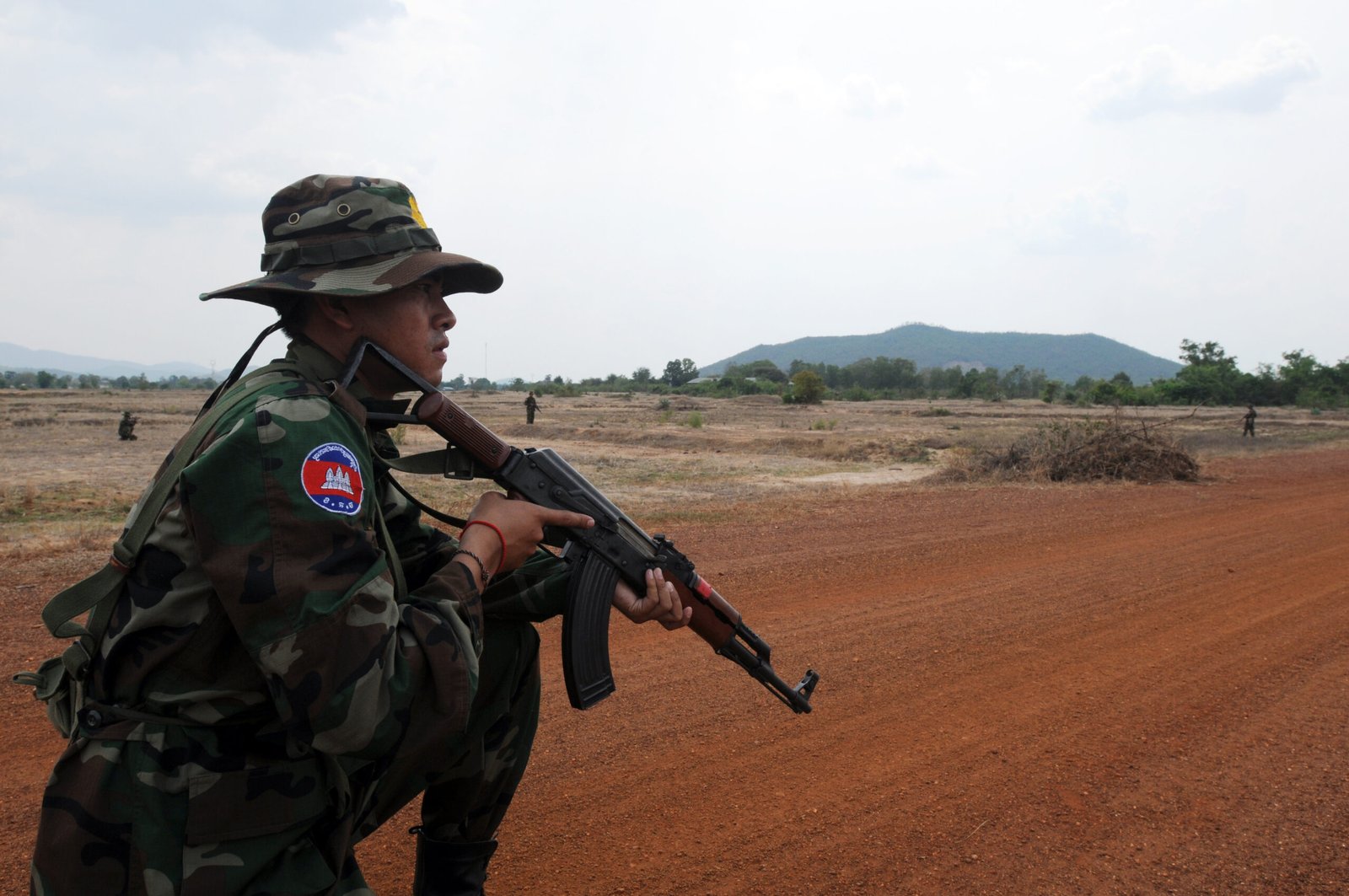 A Royal Cambodian Armed Forces soldier reacts to a simulated IED during Counter‑IED training in Kampong Speu, part of Angkor Sentinel 2012 with Idaho Army National Guard. (Staff Sgt. April Davis)