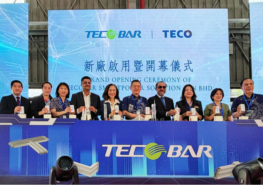 Officials gather at the inauguration of TECOBAR SmartPower Solution's new armoured busway plant in Penang, Malaysia, on 29 April. (TECO Group)