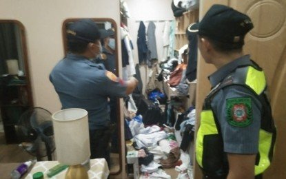 Police investigators examine evidence at the home of an American marine scientist killed in Sibulan, Negros Oriental on July 12, 2026. (NORRPO)