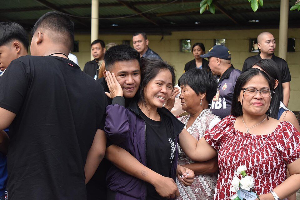 Mary Jane Veloso embraces her sons upon her arrival at the Correctional Institution for Women in Mandaluyong, Philippines, on December 18, 2024, after nearly 15 years in detention in Indonesia. (Philippines’ Bureau of Corrections Public Information Office)