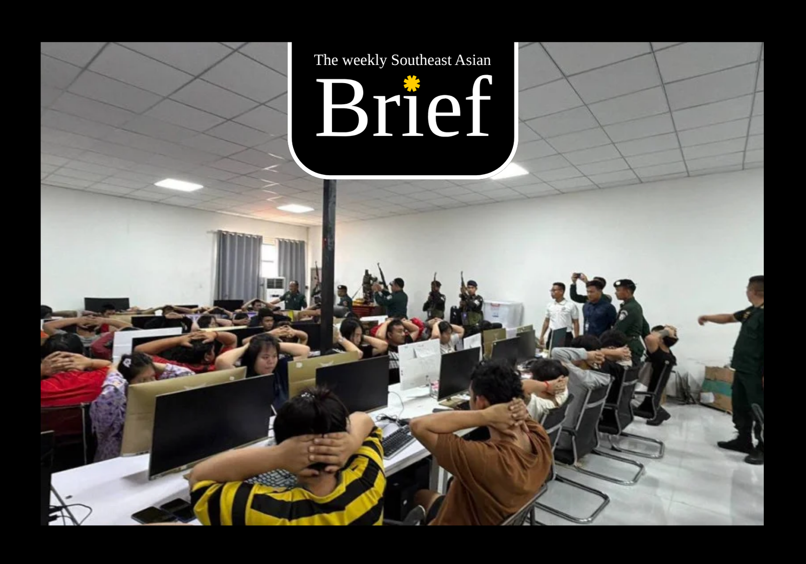 Cambodian authorities conducting a raid on an online scam network. (Agence Kampuchea Presse)